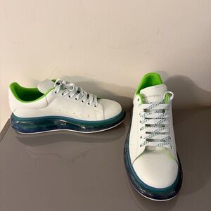 White and Green Sneakers with Blue Soles